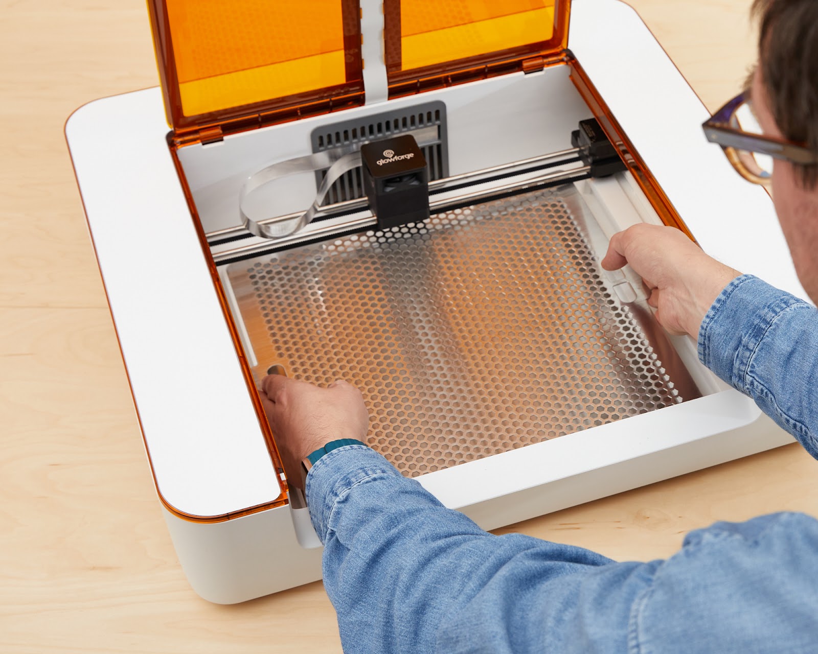 Placing cut tray into Aura.jpg