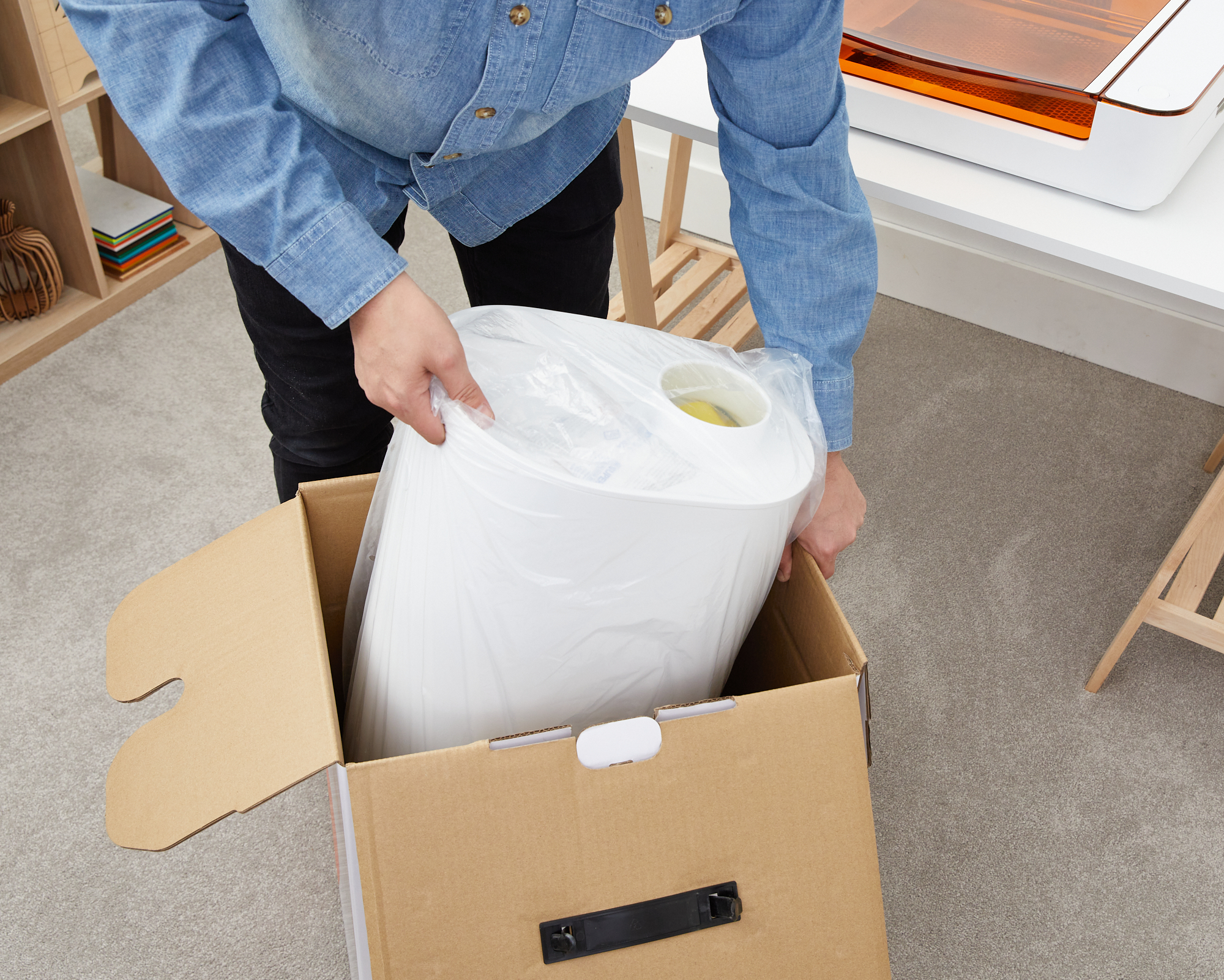 Action shot of the bagged filter being lifted from the box.jpg
