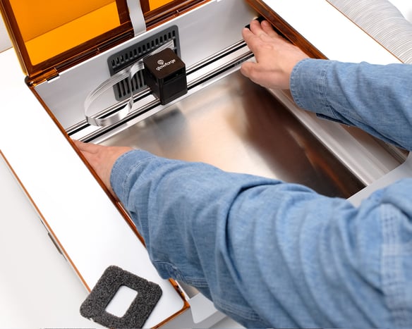 Action shot; holding the end caps, with the laser arm pulled to the back of the side rails (1).jpg