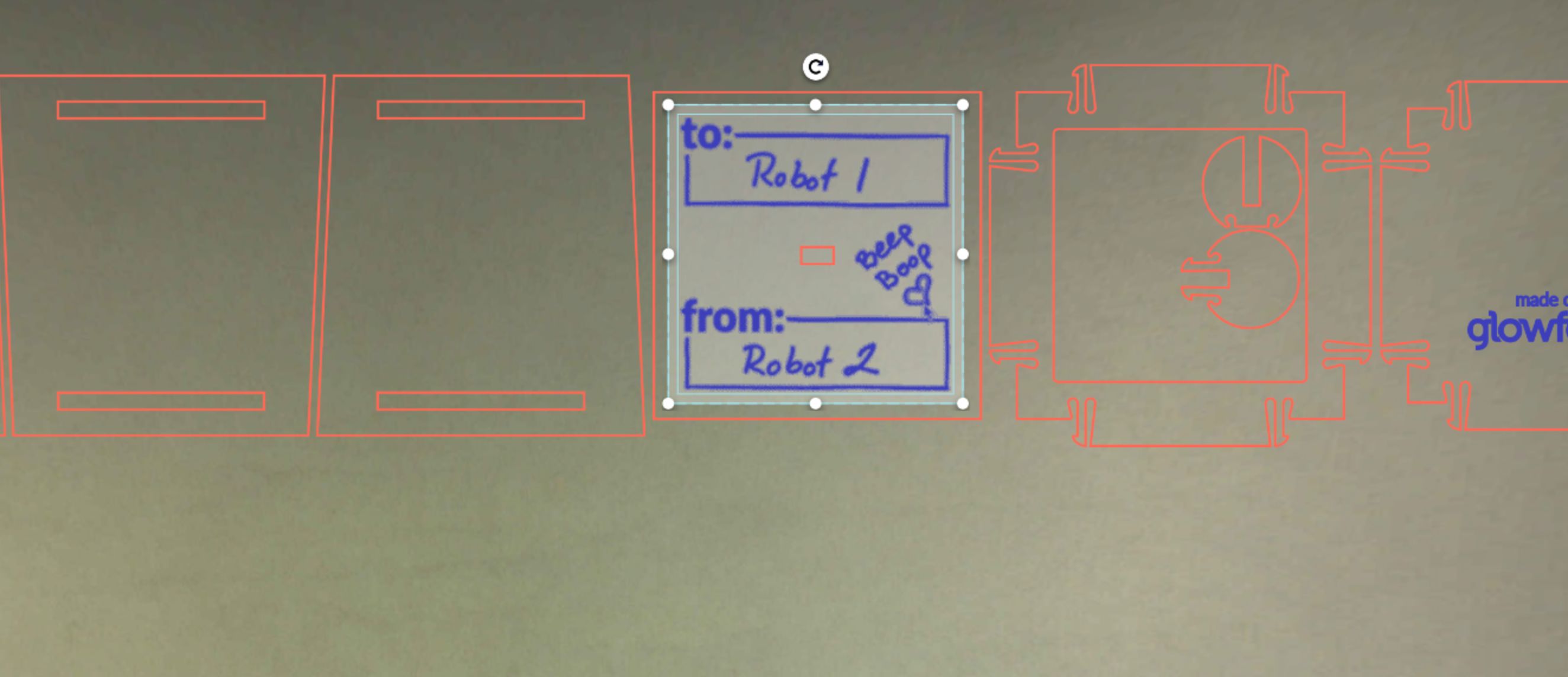 Screenshot of resizing traced artwork to fit within with pre-made artwork from the Glowforge catalog in the Glowforge App