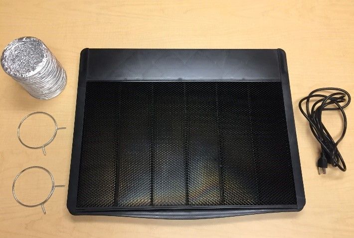 The Glowforge Accessory pack: Exhaust hose, two ring clamps, the crumb tray and a power cord