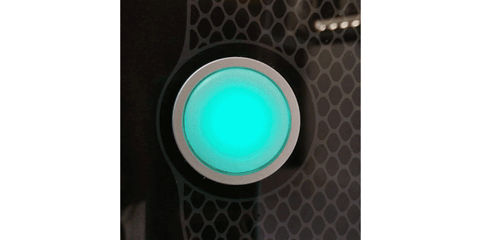 Animated image showing the Glowforge button glowing teal and then blinking teal