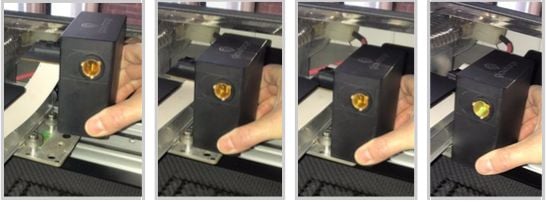 An image sequence of a hand removing the print head from the carriage plate