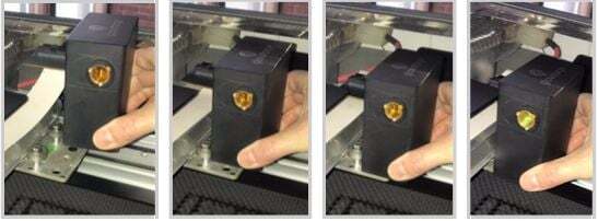 Image sequence of a hand lowering the print head onto the carriage plate