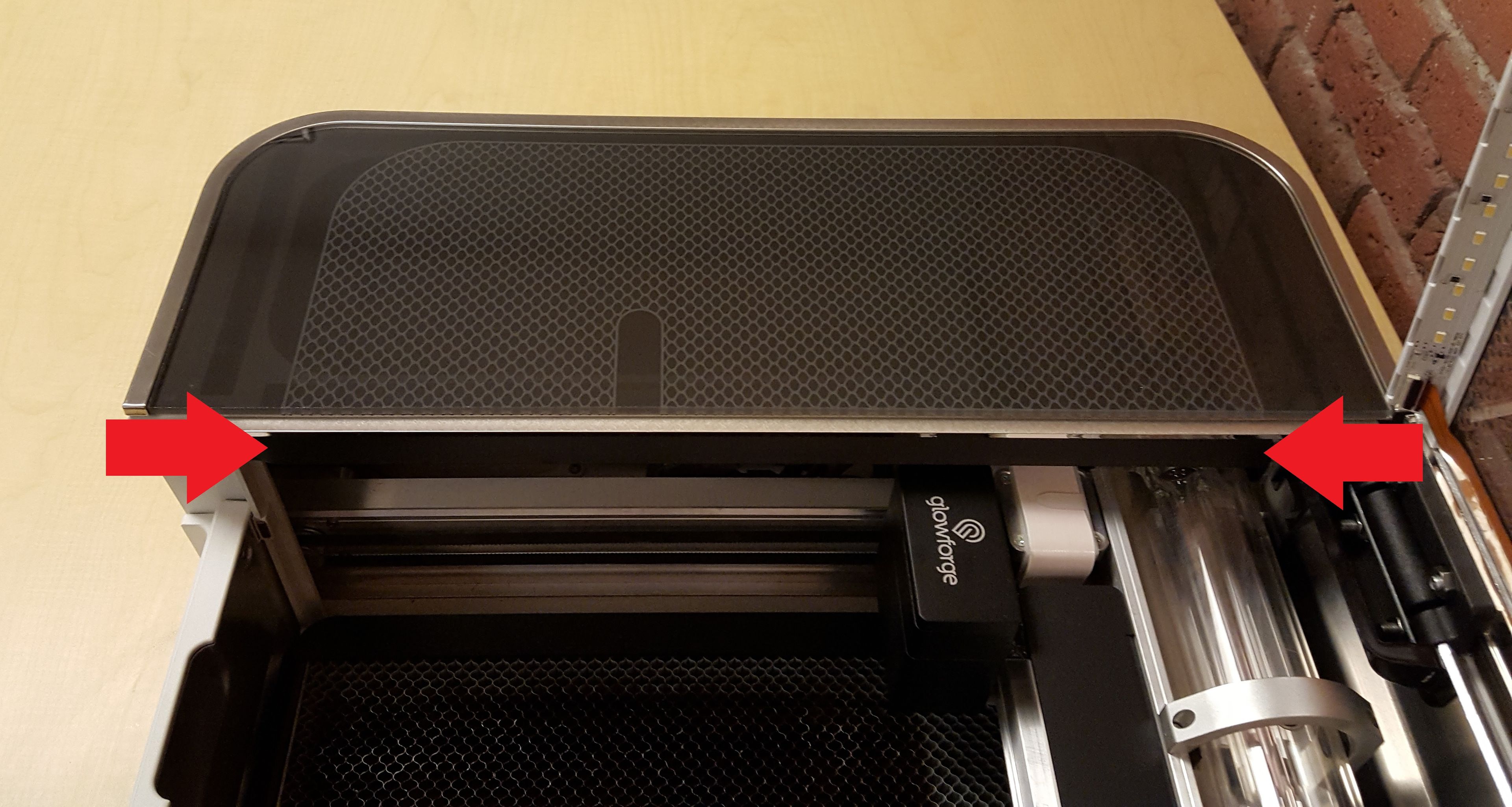 The seal located along the left side of the Glowforge lid