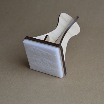 A completed, laser cut stamp.