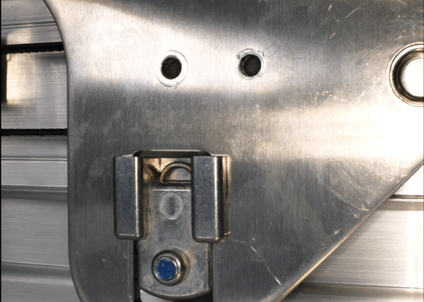 Animated gif of the belt clamp being moved into position by sliding the belt
