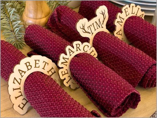 Lasercut wooden napkin rings around red napkins
