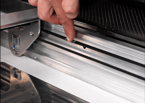 An animated gif of a finger pressing on the belt. When one side is pushed, the other doesn't move