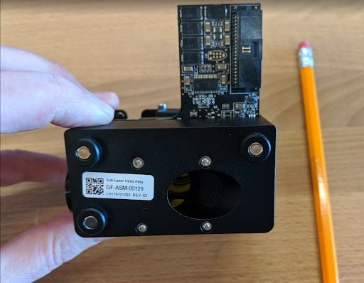 A view of the top of the print head with the magnetic cover and print head mirror removed.