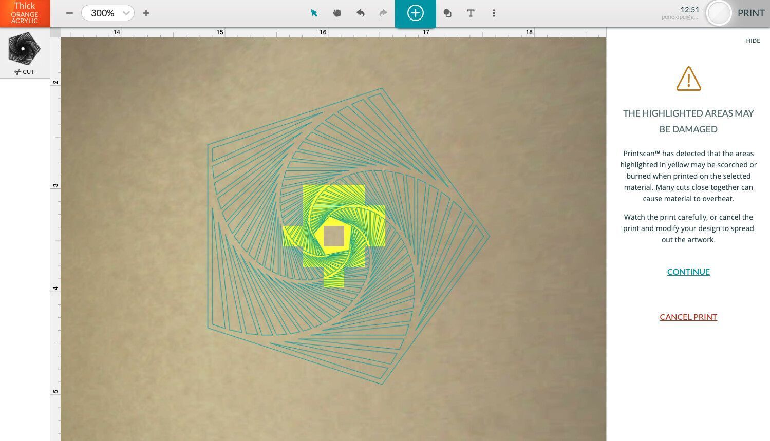 A screenshot of the Glowforge App. On the right-hand side is a warning about material damage. The specific area of the design that may damage material is highlighted.