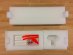 Glowforge shipping materials stored in the packaging foam that came with the unit